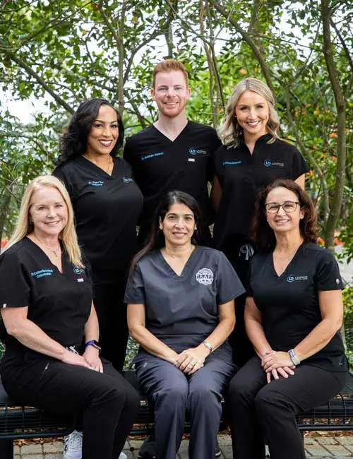 Lakeside Dental Care Doctors: Front row left to right- Dr. Catherine Schwab, Dr, Mahrufa Islam, Dr. Rubia KapustaBack row left to right- Dr. Regine Dyer, Dr. Matthew Henson, Dr. Olivia Stassen
